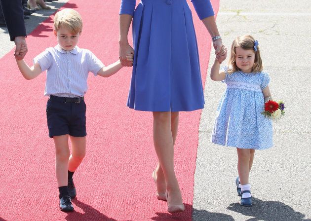 Prince William, Duke of Cambridge, Catherine, Duchess of Cambridge, Prince George of Cambridge and Princess Charlotte of Cambridge arrive at Berlin Tegel Airport during an official visit to Poland and Germany on July 19, 2017 in Berlin, Germany.