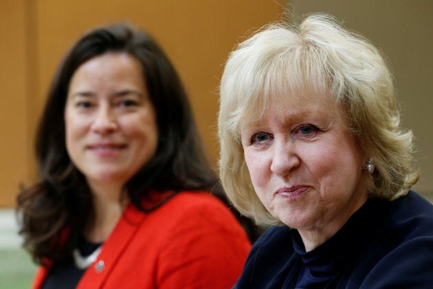 Former prime minister Kim Campbell waits with Justice Minister Jody Wilson-Raybould to testify before the House of Commons justice committee in Ottawa on Oct. 24, 2016.