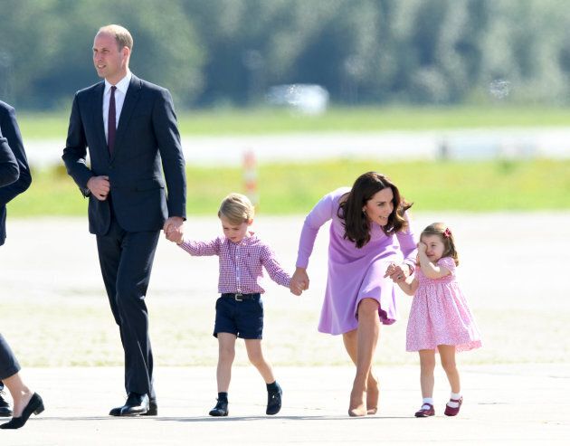 The Duchess tries to calm Princess Charlotte. (Photo by Karwai Tang/WireImage)