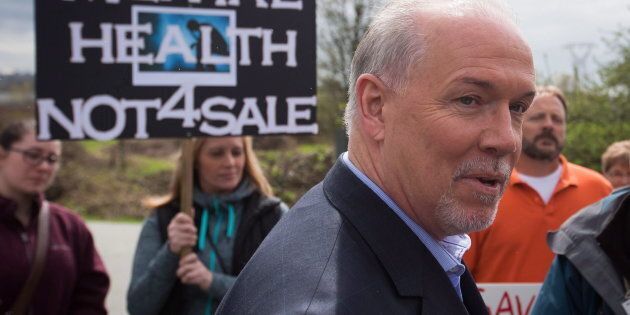 NDP Leader John Horgan speaks to supporters after an announcement about mental health and addiction services during a campaign stop at the Riverview Lands, the former site of a mental-health facility, in Coquitlam, B.C., on April 17, 2017.