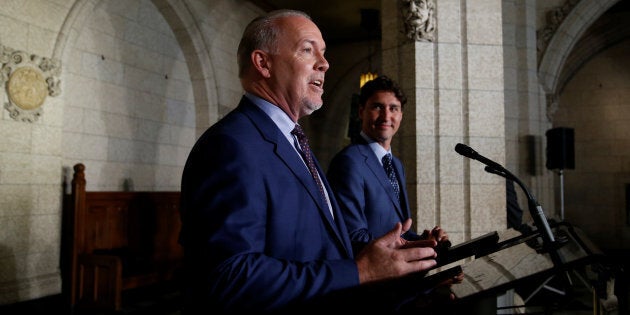 Prime Minister Justin Trudeau and B.C. Premier John Horgan take part in a news conference on Parliament Hill on July 25, 2017.