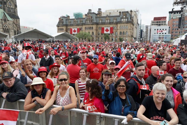 Crowds cheer during during Canada Day celebrations on Parliament Hill during a three-day official visit by The Prince Of Wales & Duchess Of Cornwall to Canada on July 1, 2017 in Ottawa, Ont.