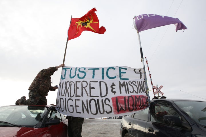 Native protesters block the VIA train tracks and Wyman's road near Shannonville, Ont., on Wednesday March 19, 2014. The protesters want justice for murdered and missing indigenous women.