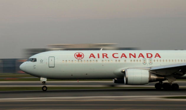 An Air Canada airplane takes off at Toronto Pearson International Airport. (Photo by Gary Hershorn/Getty Images)