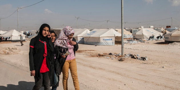 Syrian refugees are seen at the Zaatari refugee camp, on the Jordanian border on 31 May 2017.