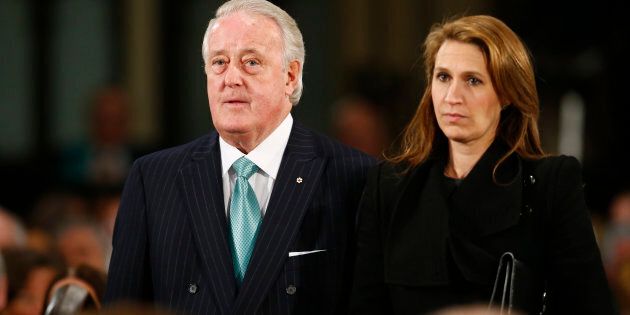 Former Canadian Prime Minister Brian Mulroney and his daughter Caroline Mulroney Lapham arrive for the state funeral of Canada's former finance minister Jim Flaherty in Toronto on April 16, 2014.
