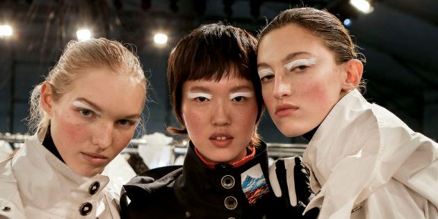 (L-R) Jess PW, model and Amber Witcomb pose Backstage prior the Kenzo Menswear Fall/Winter 2017-2018 show as part of Paris Fashion Week on January 22, 2017 in Paris, France. (Photo by Lorenzo Palizzolo/Getty Images)