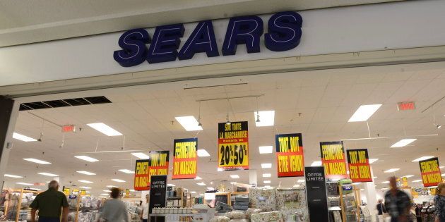 Shoppers are seen in a Sears store in Hull, Que. on Friday, July 21, 2017.