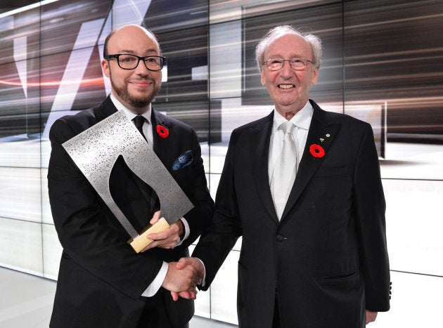 Author Sean Michael and founder Jack Rabinovitch pose with the winning prize at the Scotiabank Giller Prize on November 10, 2014 in Toronto, Canada. (PHOTO: George Pimentel/WireImage)
