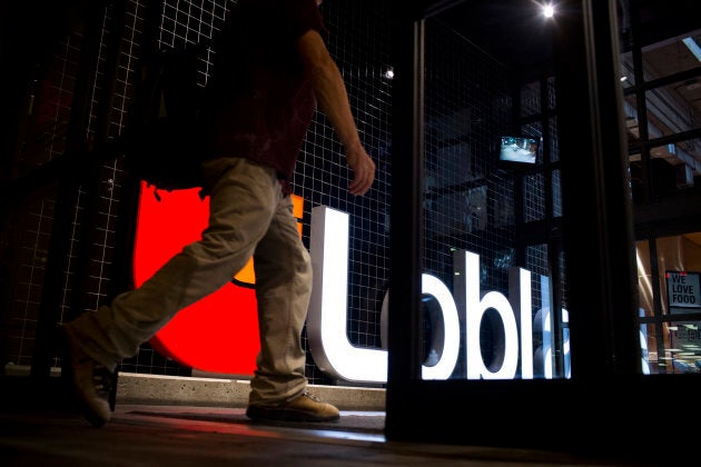 A shopper enters a Loblaw store in Toronto, Ont.