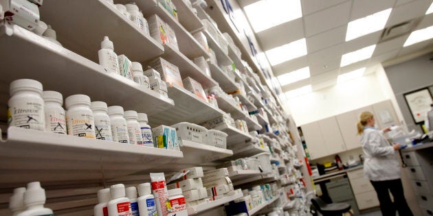 A pharmacist works at a pharmacy in Toronto, Ont., January 31, 2008.