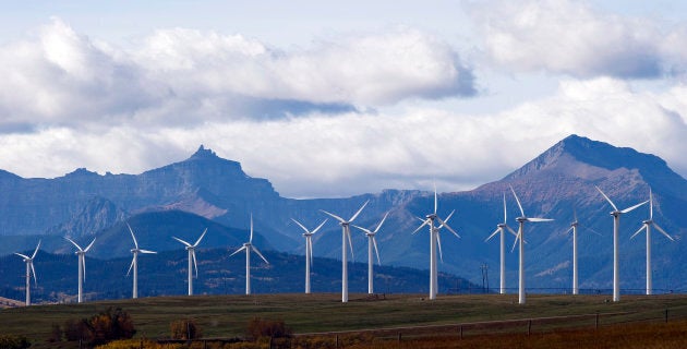 Windmills generate electricity in the windy rolling foothills of the Rocky Mountains near the town of Pincher Creek, Alberta, September 27, 2010.