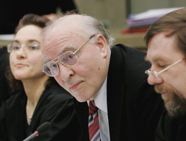 Holocaust denier Ernst Zuendel (C) and his lawyers arrive for his reopened trial on Feb. 9, 2006 in Mannheim, Germany. Zuendel was extradited from Canada to German authorities in February 2005. Denying the holocaust is a crime in Germany.