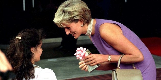 Diana, Princess of Wales, thanks a young girl for the gift she gave her outside the Commonwealth Day Council Gala lunch in Sydney November 1. Diana is in Australia on a three-day fund raising trip.