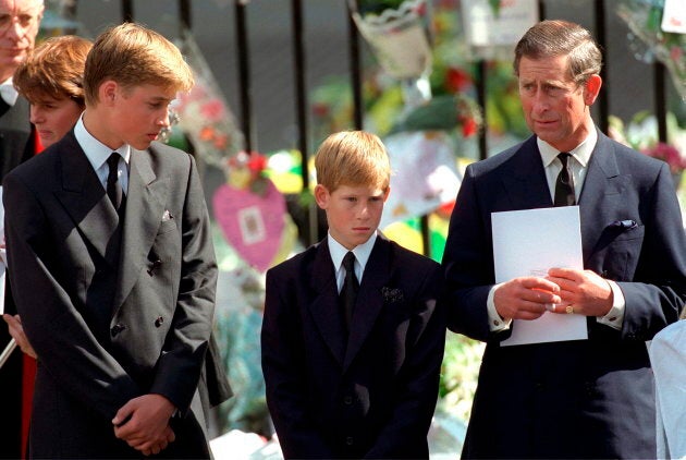 Prince William and Prince Harry with Prince Charles at Westminster Abbey for the funeral of Diana on Sept. 6, 1997. (Photo by Tim Graham/Getty Images)