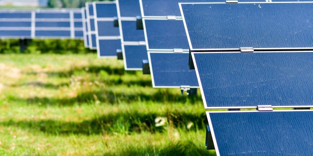 Solar panels stand at the Enbridge Inc. Sarnia Solar Farm in Sarnia, Ontario, Friday, July 21, 2017. A new report from the Columbia Institute estimates Canada could create some 4 million construction jobs in a shift to a zero-emissions economy.