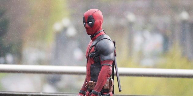 A actor believed to be Ryan Reynolds is dressed as Deadpool on a movie set in Vancouver on April 13, 2015.