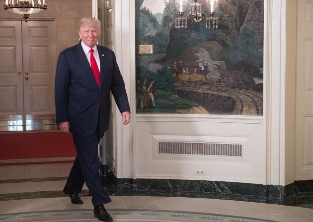 U.S. President Donald Trump arrives to make a statement in the Diplomatic Room at the White House in Washington, D.C., on Aug. 14, 2017.