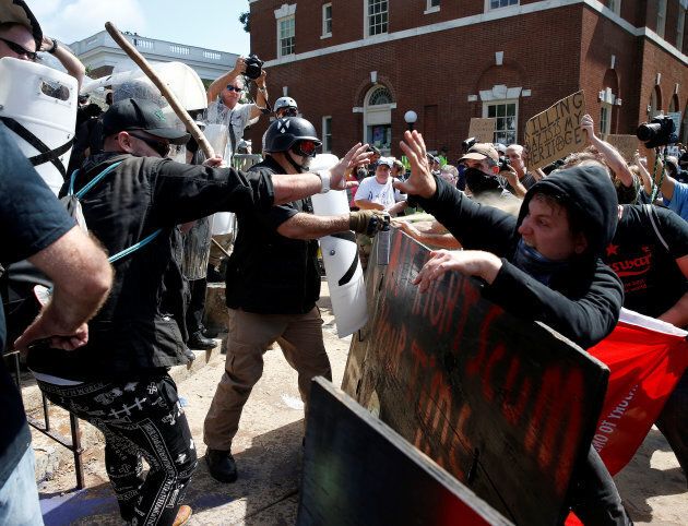 White supremacists clash with counter protesters at a rally in Charlottesville, Va. on Saturday.