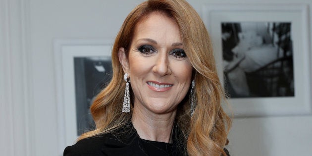 Singer Celine Dion poses before attending the Dior Haute Couture Fall Winter 2016/2017 fashion show in Paris on July 4, 2016.