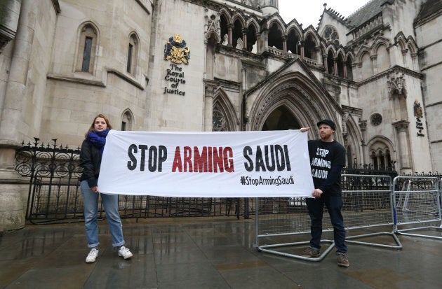 Campaigners hold a banner outside the High Court in central London, England on Feb. 7, 2017 where the legality of U.K. arms exports to Saudi Arabia is under challenge.