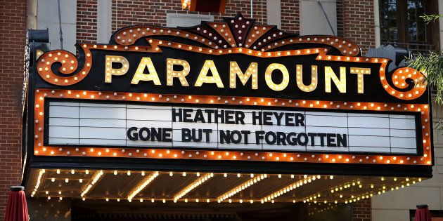 The Paramount Theater marquee bears to name of Heather Heyer, who was killed when a car slamed into a crowd of people protesting against a white supremacist rally, on the day of her memorial service August 16, 2017 in Charlottesville, Virginia. (PHOTO: Chip Somodevilla/Getty Images)