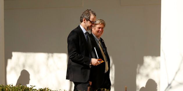 Gerald Butts, adviser to Prime Minister Justin Trudeau, walks down the West Wing colonnade with Trump chief strategist Bannon at the White House on Feb. 13, 2017.