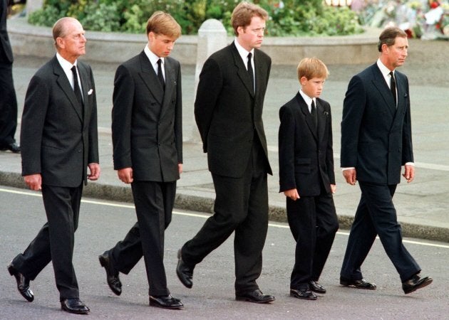 (L to R) The Duke of Edinburgh, Prince William, Earl Spencer, Prince Harry and Prince Charles walk outside Westminster Abbey during the funeral service for Diana. (Photo credit should read JEFF J. MITCHELL/AFP/Getty Images)