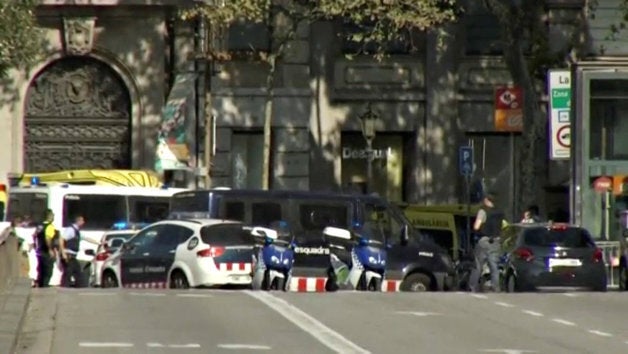 A still image from video shows a police cordon on a street in Barcelona, Spain following a van crash on Thursday.