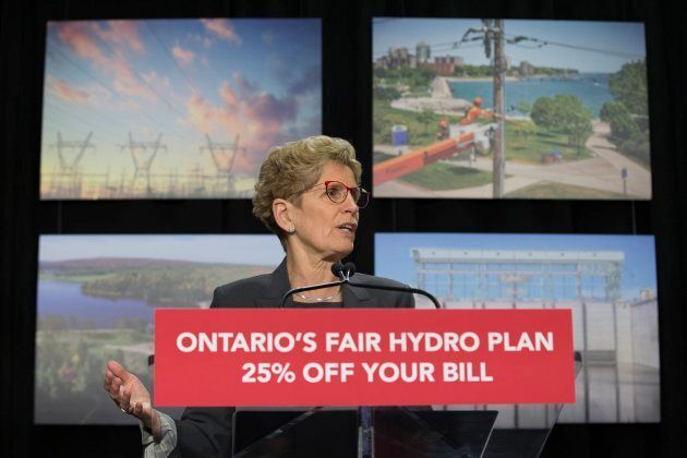 Ontario Premier Kathleen Wynn talks to the media about her plan to reduce hydro rates, on March 2, 2017.