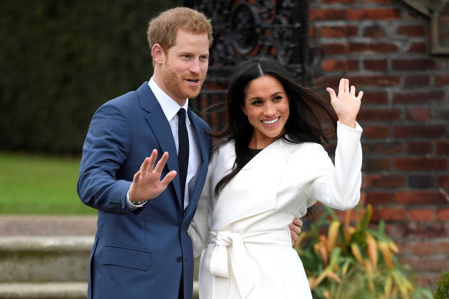 Prince Harry poses with Meghan Markle in the Sunken Garden of Kensington Palace, London, Britain, November 27, 2017.