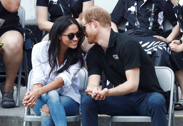 Prince Harry and his girlfriend actress Meghan Markle watch the wheelchair tennis event during the Invictus Games in Toronto on Sept. 25, 2017.