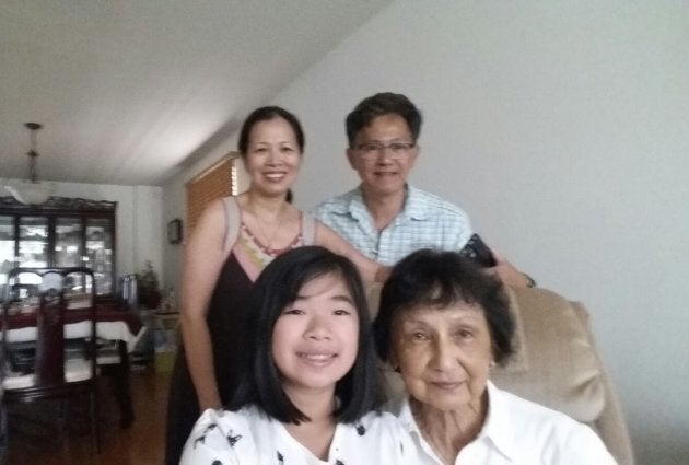 My parents, sister and paternal grandmother taking a selfie.