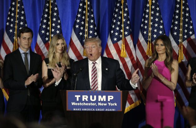 Donald Trump speaks as his son-in-law Jared Kushner, far left, daughter Ivanka, left, and wife Melania, right, listen at a presidential campaign event.