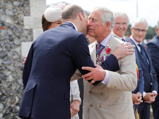 Prince Charles greets Prince William ahead of a ceremony at the Commonwealth War Graves Commisions's Tyne Cot Cemetery on July 31, 2017 in Belgium. (Photo by Darren Staples - Pool /Getty Images)