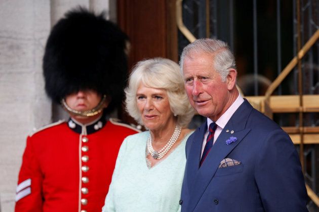 Prince Charles and Camilla, Duchess of Cornwall, take part in a ceremony officially designating the Queen's Entrance at Rideau Hall in Ottawa, July 1, 2017. (REUTERS/Chris Wattie)
