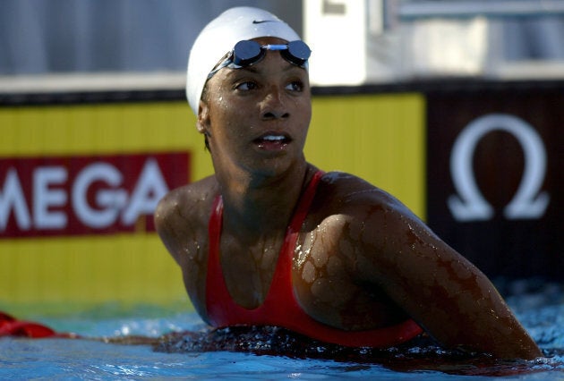 Maritza McClendon (far right) was the first African-American woman to break an American record in swimming in 2002. (Photo by Streeter Lecka/Getty Images)