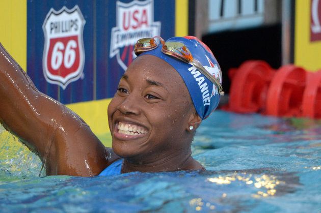 Simone Manuel reacts after winning the women's 50m freestyle in the 2014 USA National Championships. (Credit: Kirby Lee-USA TODAY Sports)