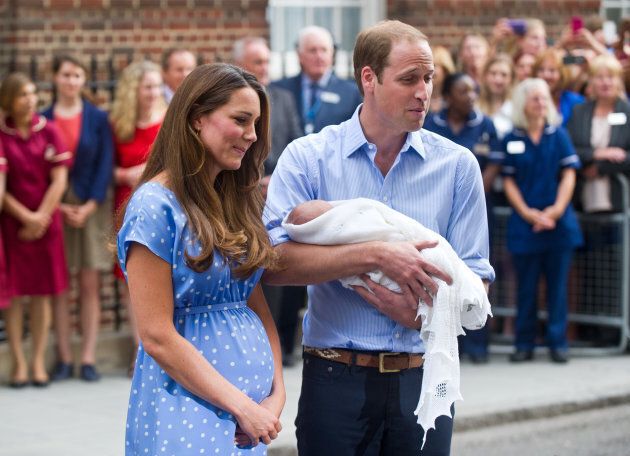 Prince WIlliam, Duke of Cambridge and Catherine, Duchess of Cambridge leave St Mary's Hospital in London, UK after the birth of Prince George on July 23, 2013. (Photo by Zak Hussein/Corbis via Getty Images)
