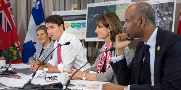 Prime Minister Justin Trudeau is joined by Laura Albanese (left), Ontario Minister of Citizenship, Kathleen Weil, Quebec Minister of Immigration, Diversity and Inclusiveness, and Ahmed Hussen, right, Federal Minister of Immigration, Refugees and Citizenship, in a meeting of the Intergovernmental Task Force on Irregular Migration on Aug. 23, 2017 in Montreal.