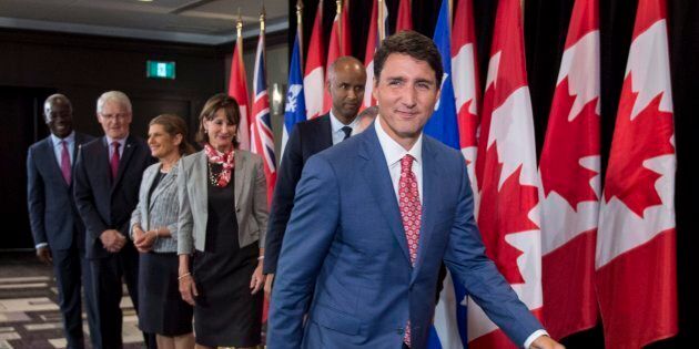 Prime Minister Justin Trudeau leaves a news conference held following a meeting with the Intergovernmental Task Force on Irregular Migration on Aug. 23, 2017 in Montreal.