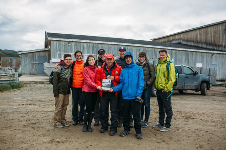 Canada C3 founder and expedition leader Geoff Green, centre, and Canada C3 participants delivering a copy of the diaries to local youth in Nain, Labrador.