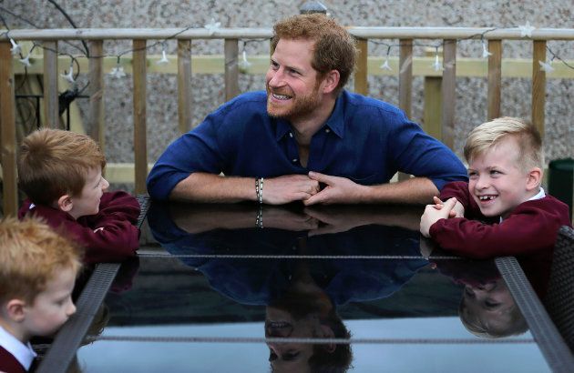 Prince Harry visits the home of Oliver Rooney, who has Wolf Hirschhorn Syndrome, (unseen) in Bramley in Leeds, Yorkshire in July during his two-day visit to the city. (NIGEL RODDIS/AFP/Getty Images)