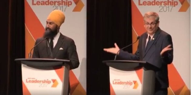 NDP leadership hopeful Charlie Angus shrugs after an answer from rival Jagmeet Singh at a debate in Montreal on Aug. 27, 2017.