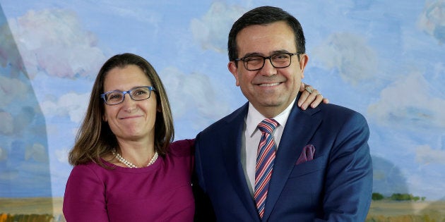 Canadian Minister of Foreign Affairs Chrystia Freeland shakes hands with Mexican Secretary of Economy Ildefonso Guajardo Villarreal before the first round of talks to renegotiate the North American Free Trade Agreement at the Embassy of Canada in Washington, D.C., Aug. 15, 2017.