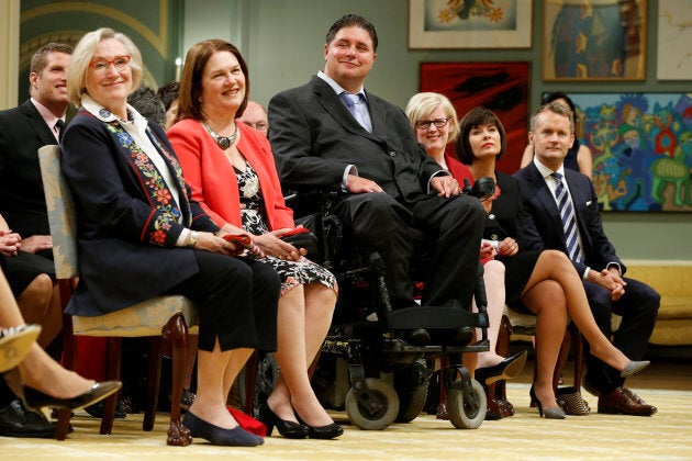 Carolyn Bennett, Jane Philpott, Kent Hehr, Carla Qualtrough, Ginette Petitpas Taylor and Seamus O'Reagan take part in a cabinet shuffle at Rideau Hall in Ottawa, on Aug. 28, 2017.