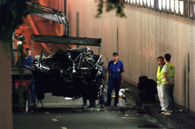 Police remove the crumpled wreck of the Mercedez-Benz which was carrying Princess Diana in Paris early August 31. The car crashed in a an underpass in central Paris. Princess Diana, her companion Dodi Al Fayed and the driver were all killed in the crash.