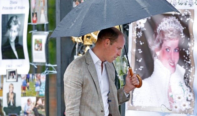 Prince William views tributes to Diana, Princess of Wales left at the gates of Kensington Palace after visiting the Sunken Garden on August 30, 2017 in London, England. The Sunken Garden has been transformed into a White Garden dedicated to Diana, Princess of Wales mother of The Duke of Cambridge and Prince Harry marking the 20th anniversary of her death. (Photo: Max Mumby/Indigo/Getty Images)