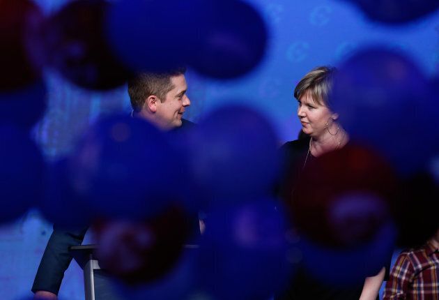 Balloons drop around Andrew Scheer and his wife Jill after winning the leadership during the Conservative Party of Canada leadership convention in Toronto, Ont. on May 27, 2017.