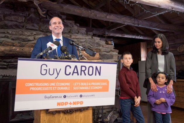 Guy Caron stands with his son Dominic, 8, daughter Edith, 5, and wife Valerie Stansfield as he announces that he will run for the leadership of the New Democratic Party, on Feb. 27, 2017 in Gatineau, Que.